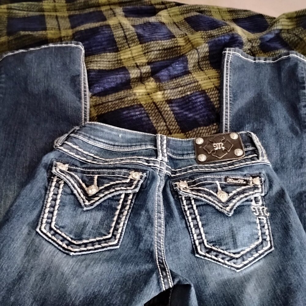 Miss me 27 never been worn. Too small